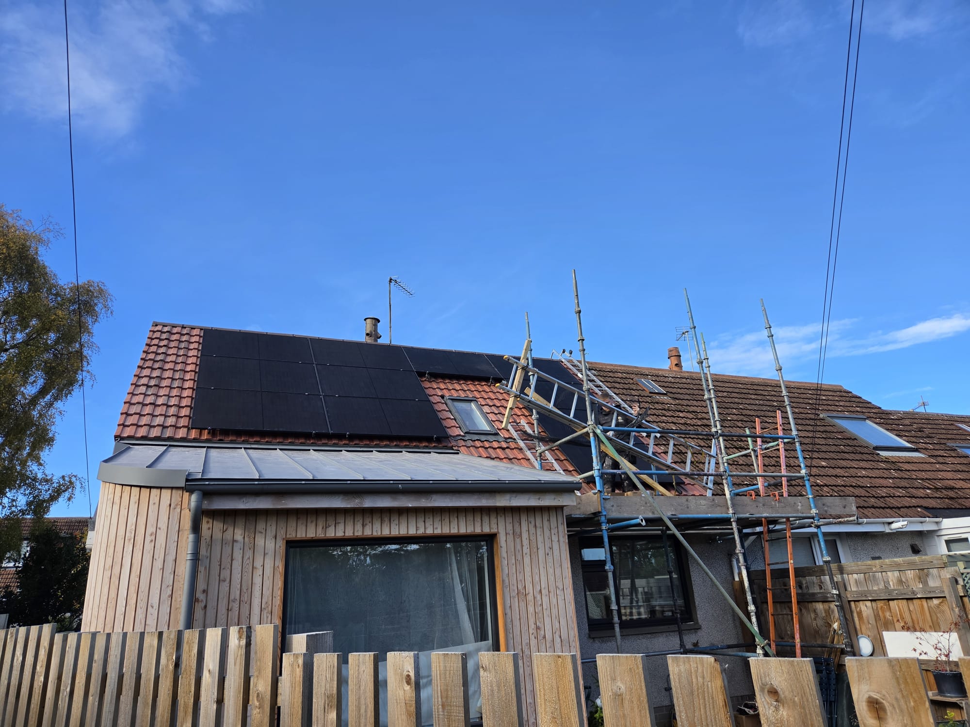 All-black solar PV panels on a tiled roof during the Longniddry solar and battery installation