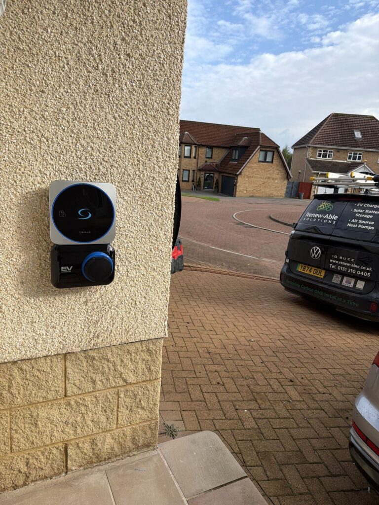 SALUS home EV charger beside the property's off-street parking area in Glasgow